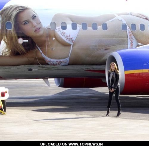 Bar Refaeli at Sports Illustrated Unveils the SI One Southwest Airline Boeing 737-700 at LaGuardia Airport in New York Bar Refaeli at Sports Illustrated Unveils the SI One Southwest Airline Boeing 737-700 at LaGuardia Airport in New York